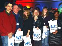 Participants with W3C bags and info material at the New Years event