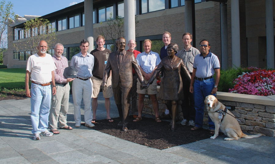 9 TAG members in front of the Kauffman foundation conference center