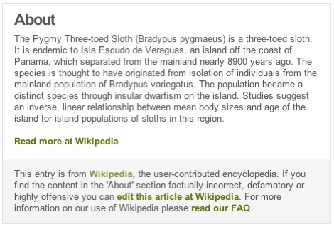 A description of the pygmy three-toed sloth is followed by an attribution that reads "This entry is from Wikipedia, the user-contributed encyclopedia. If you find the content in the 'About' section factually incorrect, defamatory or highly offensive you can edit this article at Wikipedia. For more information on our use of Wikipedia please read our FAQ."