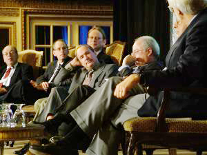 Speakers seated on stage