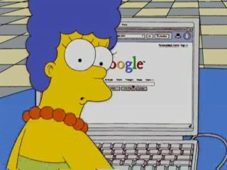 Marjorie "Marge" Simpson using the Web (© Fox Broadcasting Company)