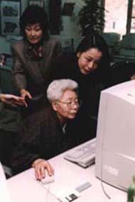 Senior woman using computer