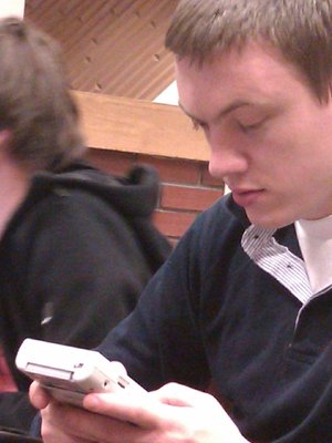 Michal Buzynski plays with a Gameboy during the workshop