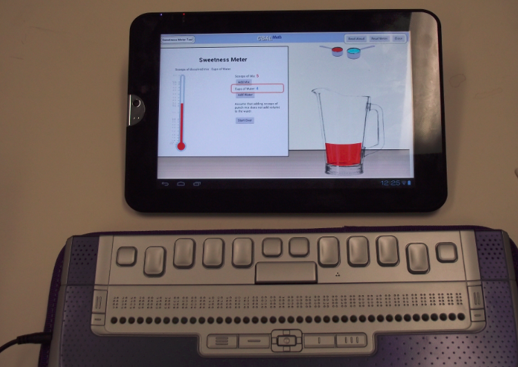 A photo of a refreshable braille display used with an Android tablet via a bluetooth wireless connection.