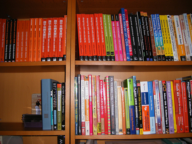Photo of a bookshelf with lots of technical books