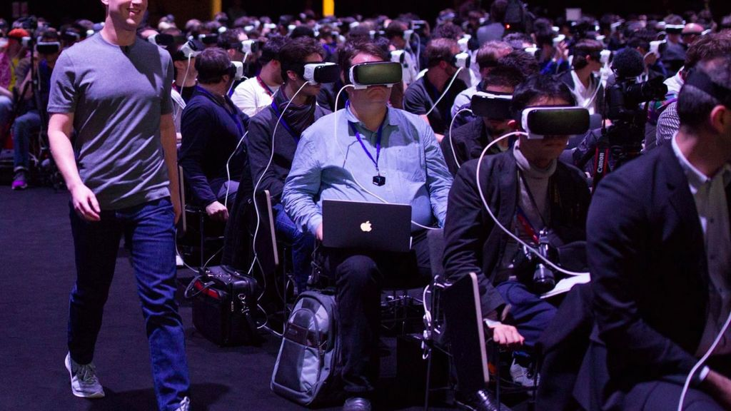 Ein Raum voller (männliches) Publikum und alle mit VR-Brillen