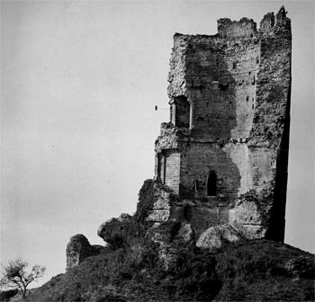 The castle lies in ruins, the original tower all that remains in one piece.