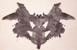 An abstract, freeform inkblot.