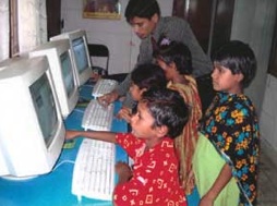 Photo of kids using computers.